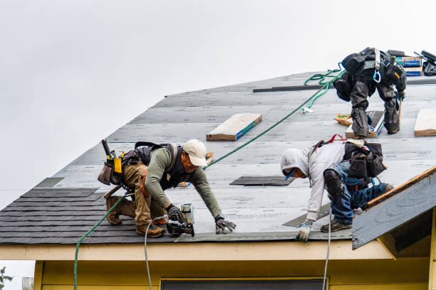 Professional Gutter Installation technician working in Burrows, IN